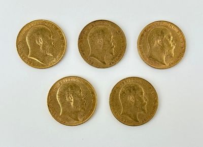 four gold coins with a picture of a man and a woman on them
