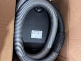 a box with a hose in it and a box with a hose inside of it