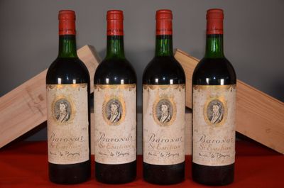 three bottles of wine sitting on top of a table next to a wooden box