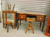 two desks and two stools in a room