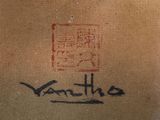 a close up of a piece of cloth with writing on it