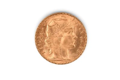 l'image d'une pièce d'or sur laquelle figure une tête de femme