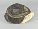 a hat that has a mesh covering on top of it
