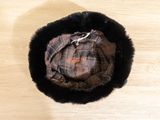 a hat that is sitting on a wooden table