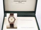 an image of a watch in a box on a white surface
