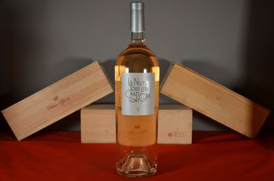 a bottle of wine that is sitting on a table