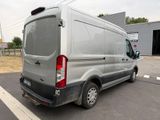 a silver van that is parked in the parking lot