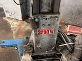 a machine that is sitting on a blue table
