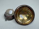 a silver plate with a silver lid and a silver plate with a silver plate with a silver lid and a silver plate with a silver plate with a silver