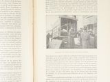 an open book with a picture of a train on it