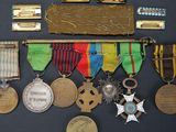 a display of medals and medals on a black surface