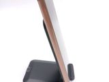 a cell phone that is sitting on a stand