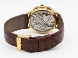 an image of a wrist watch with a brown leather strap