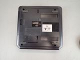 a black laptop with a small button on the side