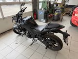 a motorcycle that is parked inside of a building
