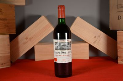 a bottle of wine that is sitting on a table
