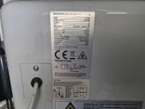 a label on the back of a machine that is not working