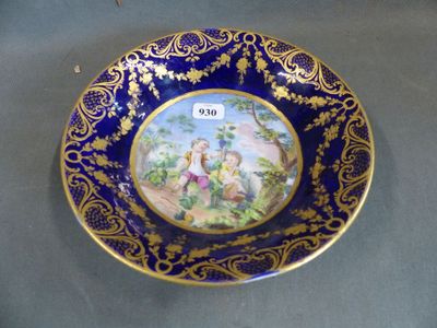 a plate with a picture of a man and a woman on it