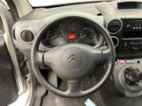 the interior of a car with a steering wheel and dashboard controls