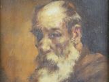 un vieux tableau représentant un homme à la barbe blanche