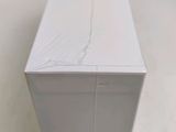 a close up of a white box on a white surface