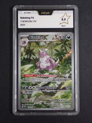 a close up of a card in a plastic holder on a table
