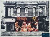 an old photo of a group of people standing in front of a building