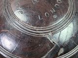 a close up of a vase on a table