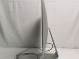 a computer that is sitting on a white table