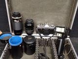 a suitcase with a bunch of camera equipment in it