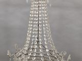 a close up of a crystal chandelier hanging from a ceiling