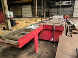 a machine that is working on a piece of metal