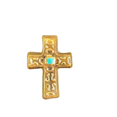 gold cross with turquoise stone in center on white background