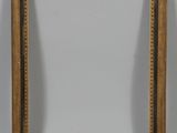 a gold frame with a white background and a gold border