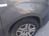 a black car that has a sticker on the side of it