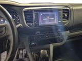 a picture of a dashboard of a car with a digital screen