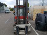 a forklift that is parked in a parking lot