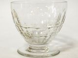 a glass bowl that is sitting on a table