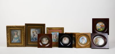 a lot of framed pictures on a white surface