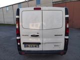 a white van that is parked in a parking lot