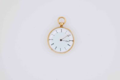 a close up of a clock on a white surface with a white background