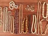 many different types of beads on the table