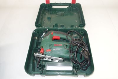 an image of a green tool box with a corded hammer in it