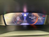a digital display on the dashboard of a car
