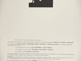 the back cover of a book with an image of a man and a woman holding a hammer