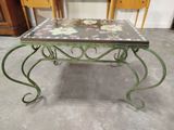 a table with a flower design on it in a room