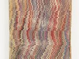 a close up of an old book with a pattern on it