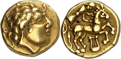 a gold coin with an image of a woman and a horse on it