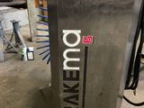 a close up of a machine that is sitting on a floor