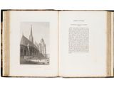 an open book with a picture of a church in the background